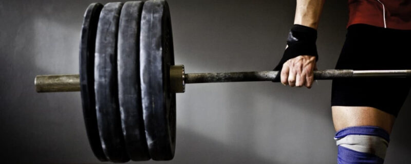 Close up of a person lifting weights