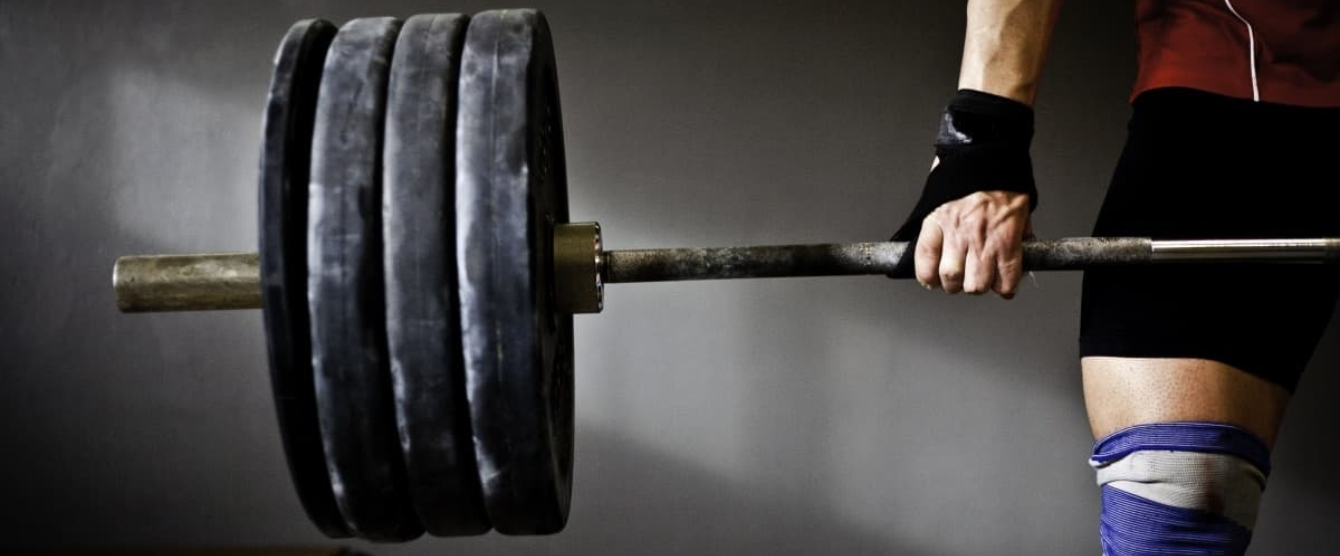 Close up of a person lifting weights