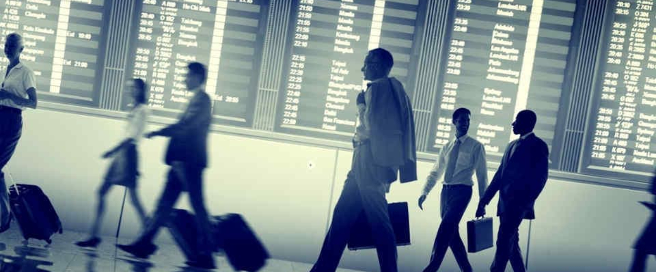 Crowded airport with people walking everywhere