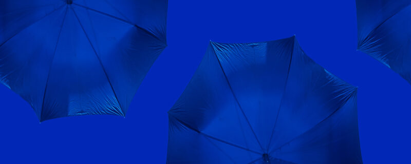 Top view of blue umbrellas