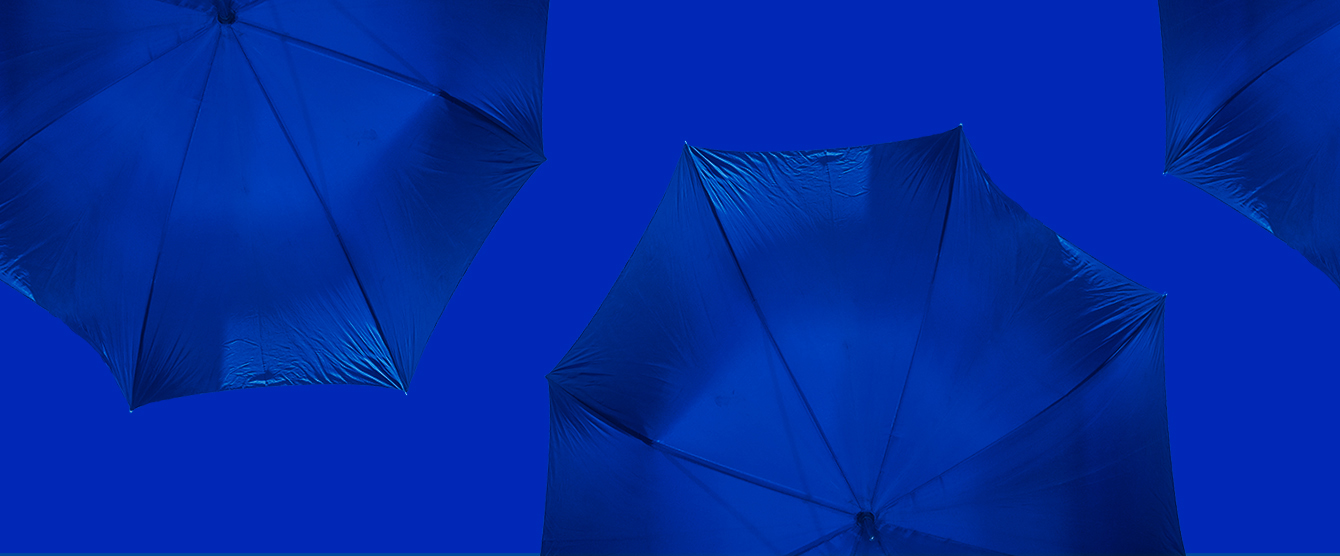 Top view of blue umbrellas