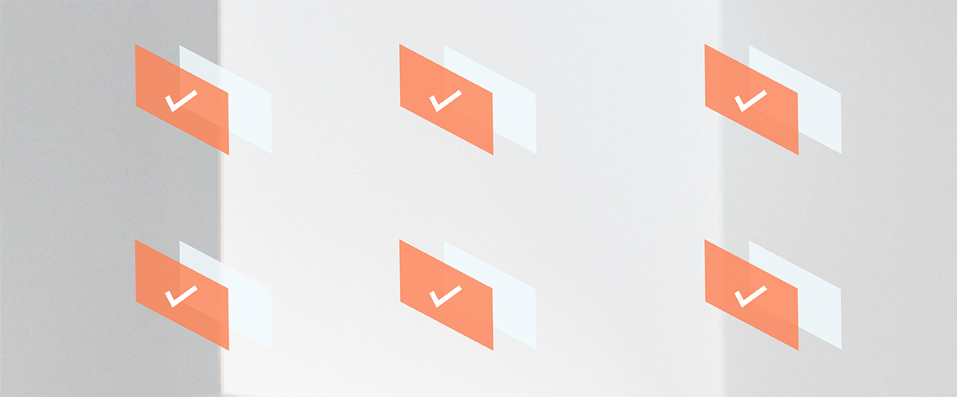 A graphic of orange squares with white checkmarks inside of them