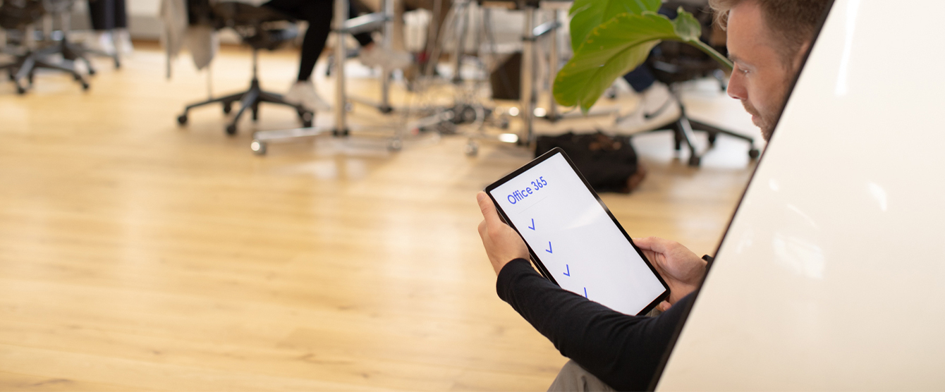 A person looking at a tablet